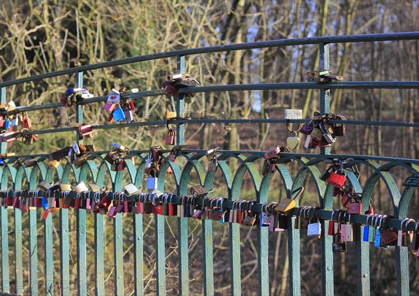 Love locks on the railing of a bridge, North Rhine-Westphalia, Germany, Europe