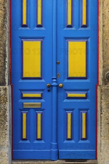 Typical colourful front door in Alfama, yellow, blue, lacquer, varnished, door, entrance, colourful, colourful, primary colours, complementary, complementary colours, complementary contrast, colour contrast, wooden door, old, historical, craft, colour design, art, decoration, exterior door, painting, colour coating, house, facade, property, Lisbon, Portugal, Europe