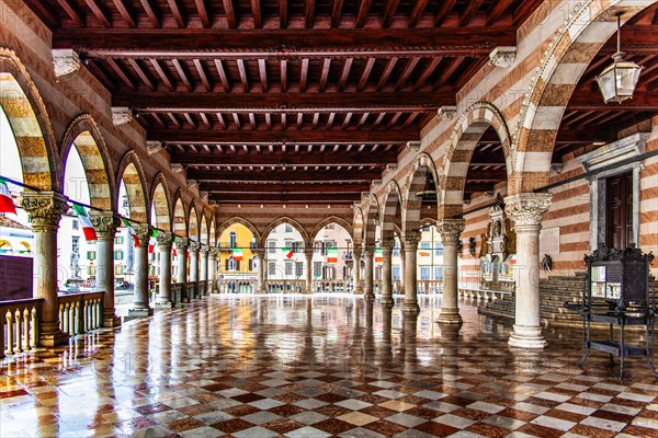 White and pink striped Loggia del Lionello in the finest Venetian Gothic style, 15th century in Piazza della Liberta, Udine, most important historical city in Friuli, Italy, Udine, Friuli, Italy, Europe