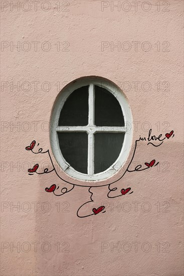 Street art, painted house wall with hearts and lettering on the theme of love, Montmartre, Paris, Ile-de-France, France, Europe