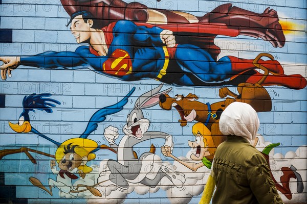 Painted house wall with comic figures, Speedy Conzales, Bugs Bunny, Superman, graffiti, Porte de Clignancourt, Paris, France, Europe