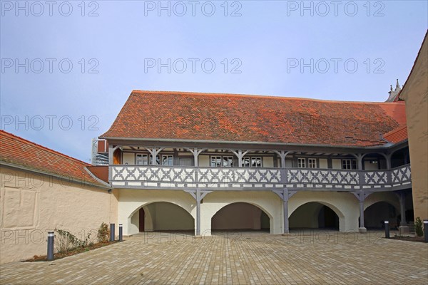 Hospital with arcade, historic half-timbered house, inner courtyard, Ochsenfurt, Lower Franconia, Franconia, Bavaria, Germany, Europe