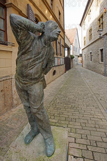 Sculpture Eavesdropper by Karl-Henning Seemann 2007, gesture, gesticulation, listening, hearing, ear, arm, hand, listening, standing, bronze, Marktbreit, Lower Franconia, Franconia, Bavaria, Germany, Europe