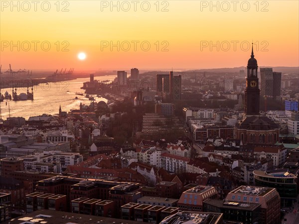 Aerial view of St. Michael's Church (Michel) with harbour and Elbe at sunset, Hamburg, Germany, Europe