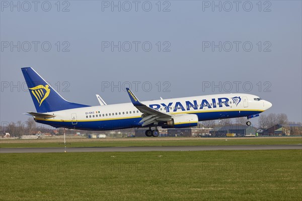 Ryanair Boeing 737-8AS with registration EI-EKC lands on the Polderbaan, Amsterdam Schiphol Airport in Vijfhuizen, municipality of Haarlemmermeer, Noord-Holland, Netherlands