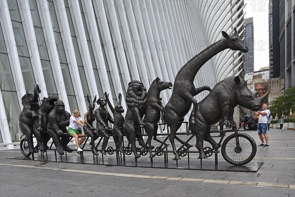 Artwork for endangered animals, bronze sculptures on bicycle, exhibition A Wild Life for Wildlife, artists Gillie and Marc, in front of Oculus building, Transportation Hub, Ground Zero, Lower Manhattan, New York City, New York, USA, North America
