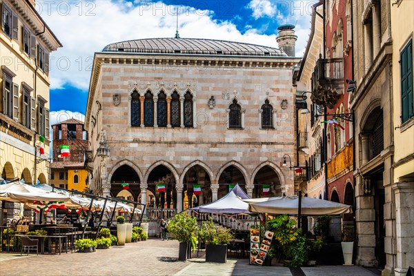 White and pink striped Loggia del Lionello in the finest Venetian Gothic style, 15th century in Piazza della Liberta, Udine, most important historical city in Friuli, Italy, Udine, Friuli, Italy, Europe