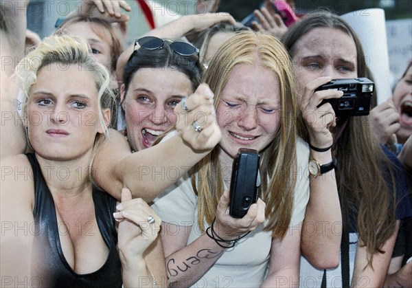 Fans of the boy band Caught in the Act cry and scream during the last concert of the Dutch boy band Caught in the Act in Magdeburg, 16 August 1998