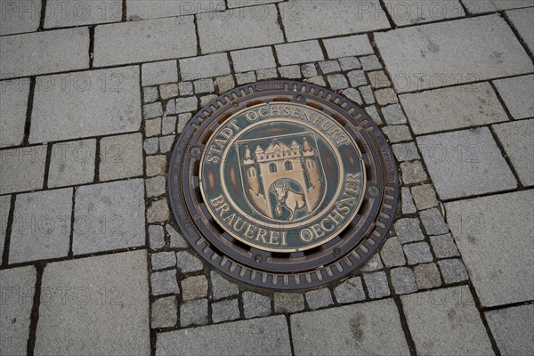 Manhole cover with inscription brewery, town, ground, round, main street, Ochsenfurt, Lower Franconia, Franconia, Bavaria, Germany, Europe