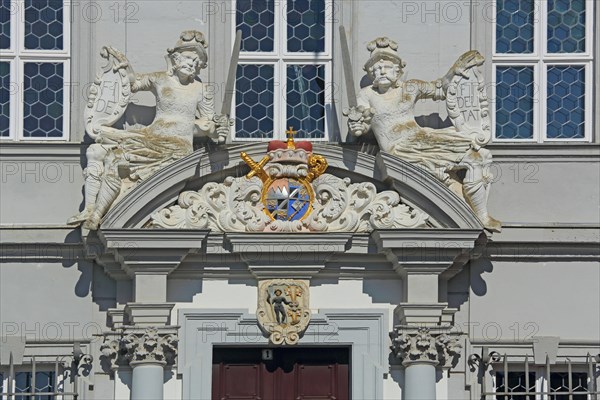 Portal with town coat of arms, figures and decorations from the baroque town hall, detail, sword, shield, two, market square, Iphofen, Lower Franconia, Franconia, Bavaria, Germany, Europe