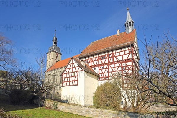 Historic gate tower built in 1545 and landmark with St John's Church, gatehouse, half-timbered house, Burgbernheim, Middle Franconia, Franconia, Bavaria, Germany, Europe