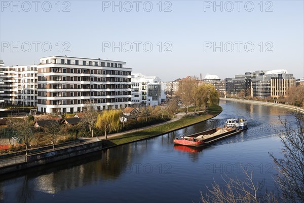 A barge loaded with sand sails on the Spree in the Charlottenburg district of Berlin, Berlin, 07/03/2024