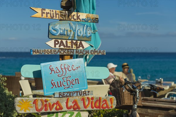 Signs in a cafe on the beach in German, Cala Rajada, Majorca, Majorca, Balearic Islands, Spain, Europe