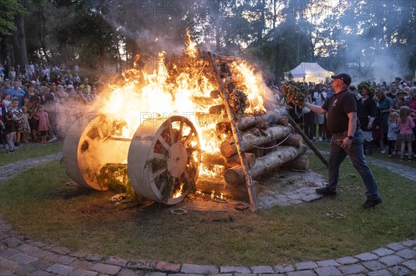 Riga. Ligo festival in Dzeguzkalna Park. Burning of the headdress (oak leaf wreath, flower wreath) from the previous year, Riga, Latvia, Europe