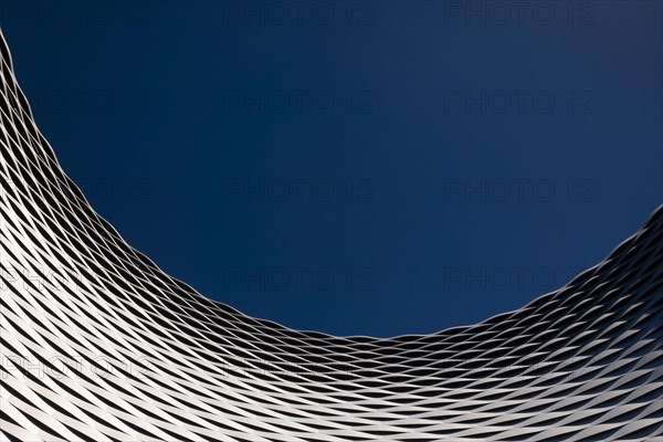 The Modern Building with Hole in Fair Basel with Clear Blue Sky and Sunlight in Switzerland