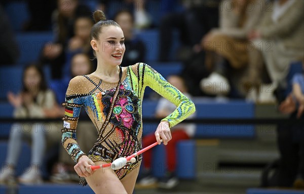 World champion Darja Varfolomeev (GER), action, clubs, rhythmic gymnastics, RSG, Schmiden International 2024, Fellbach, Baden-Wuerttemberg, Germany, Europe