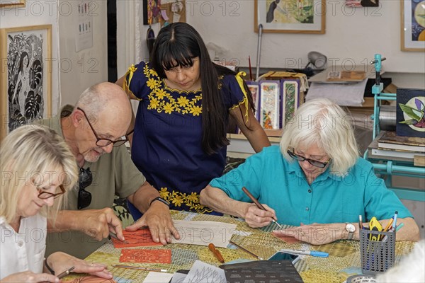 Oaxaca, Mexico, Alejandra Canseco Alhil leads an engraving workshop at her art studio, Alalimon Laboratorio de Arte. She was a leader of the 2006 protests in Oaxaca which took control of the city for several months. She had to flee the city after the government regained control, but returned to operate her art studio, Central America