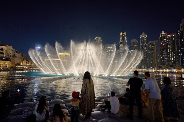 The Dubai Fountain water features on Lake Burj Khalifa. Dubai, United Arab Emirates, Asia