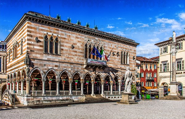 White and pink striped Loggia del Lionello in the finest Venetian Gothic style, 15th century in Piazza della Liberta, Udine, most important historical city in Friuli, Italy, Udine, Friuli, Italy, Europe