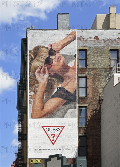 Hand-painted mural, woman with sunglasses, advert for GUESS, SoHo district, Manhattan, New York City, New York, USA, North America