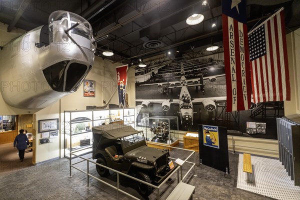 Lansing, Michigan, The Michigan History Museum. The nose of a B-24 Liberator Bomber and a military Jeep are in a display about the Arsenal of Democracy. The term was applied to Michigan during World War II because so much military equipment was manufactured in the state