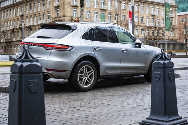 An SUV parked on a pavement on the KOe in Duesseldorf city centre