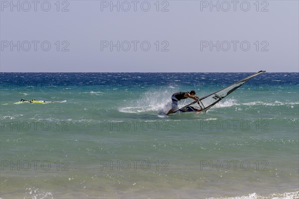 Surfer at Playa de Sotavento, Costa Calma, Fuerteventura, Canary Island, Spain, Europe