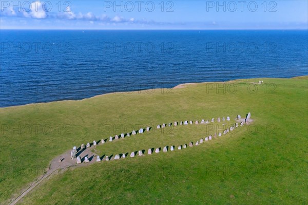 Aerial view over Ale's Stones, Ales stenar, megalithic stone oval monument representing stone ship near Kaseberga, Skane, Sweden, Europe