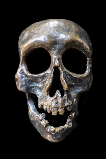 Human Skull Made in Metal on Black Background in Switzerland
