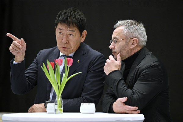 Morinari Watanabe, President of the FIG Federation Internationale de Gymnastique, in conversation with Alfons Hoelzl, President of the German Gymnastics Federation, rhythmic gymnastics, RSG, Schmiden International 2024, Fellbach, Baden-Wuerttemberg, Germany, Europe