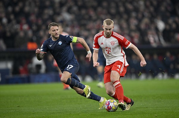 Duel, action Matthijs de Ligt FC Bayern Munich FCB (04) against Ciro Immobile Lazio Rome (17) Champions League, CL, Allianz Arena, Munich, Bayern, Germany, Europe