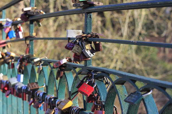 Love locks on the railing of a bridge, North Rhine-Westphalia, Germany, Europe