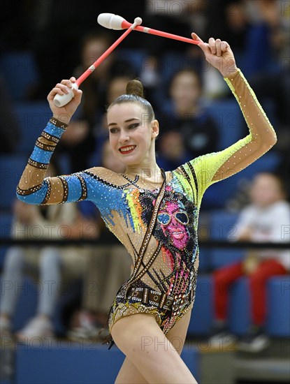 World champion Darja Varfolomeev (GER), action, clubs, rhythmic gymnastics, RSG, Schmiden International 2024, Fellbach, Baden-Wuerttemberg, Germany, Europe