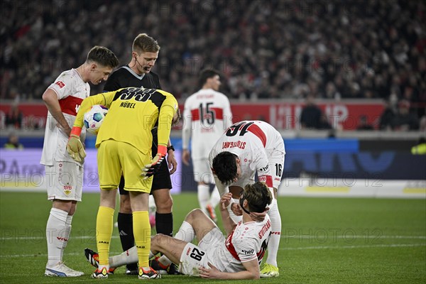 Anthony Rouault VfB Stuttgart (29) injured, broken jaw, Atakan Karazor VfB Stuttgart (16) Angelo Stiller VfB Stuttgart (06) Referee Referee Patrick Ittrich, MHPArena, MHP Arena Stuttgart, Baden-Wuerttemberg, Germany, Europe