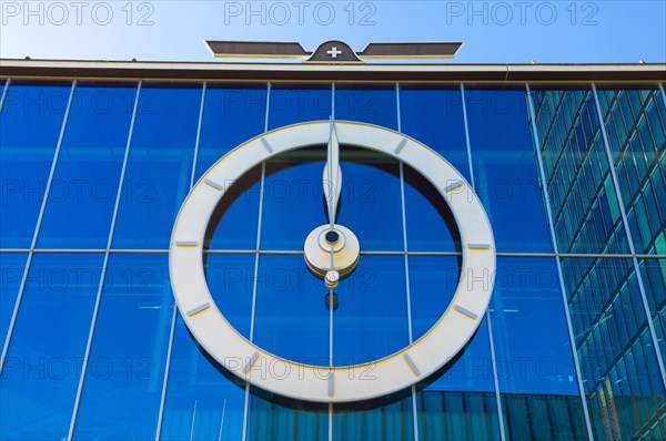 Big Clock on Glass Facade in Basel, Switzerland, Europe