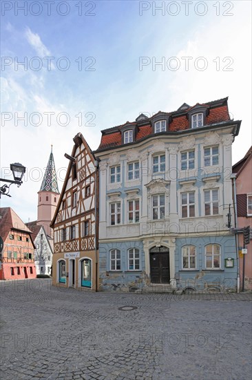 Building built in the 18th century at the wine market and church tower of St Maria am See church, Seegasse, Bad Windsheim, Middle Franconia, Franconia, Bavaria, Germany, Europe