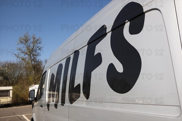 On Milf's modified lettering on a van of the car sharing provider Miles, Duesseldorf, Germany, Europe