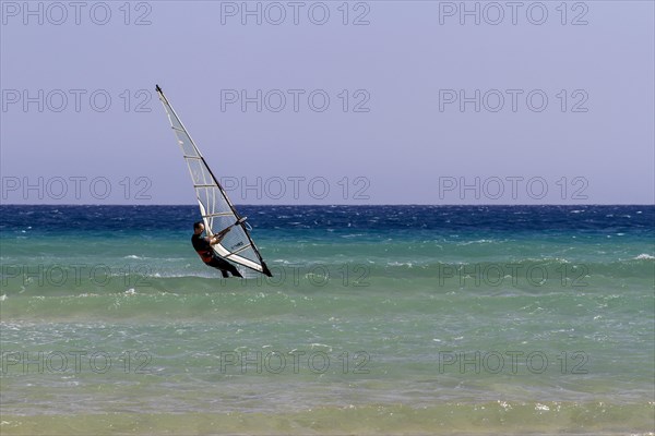 Surfer at Playa de Sotavento, Costa Calma, Fuerteventura, Canary Island, Spain, Europe