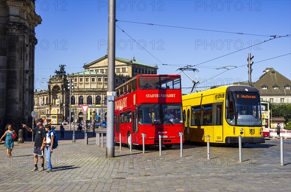 Tourist and traffic situation, double-decker bus for city tours and tram line 8 on the Schlossplatz in Dresden, Saxony, Germany, for editorial use only, Europe