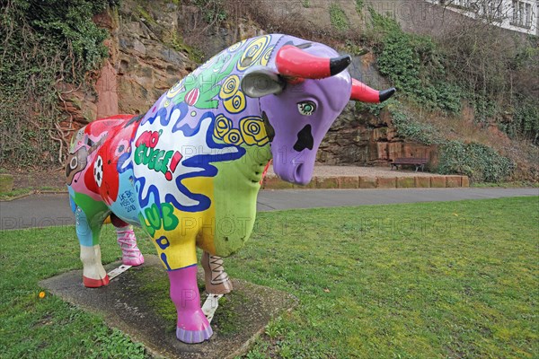 Colourful bull figure, sculpture, inscription, kitsch, rock staircase, bird staircase, Pirmasens, Palatinate Forest, Rhineland-Palatinate, Germany, Europe
