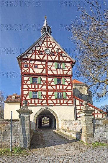 Historic gate tower built in 1545 and landmark, gatehouse, half-timbered house, Burgbernheim, Middle Franconia, Franconia, Bavaria, Germany, Europe