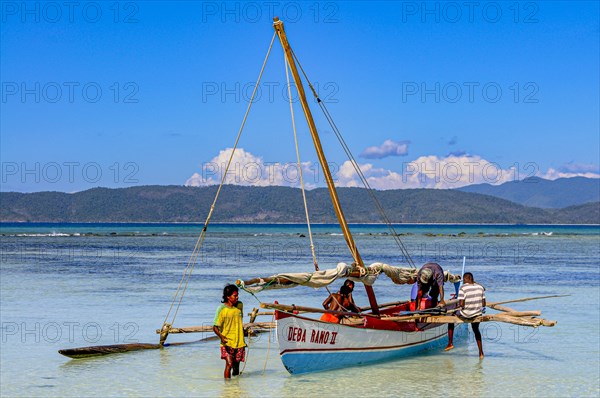 Sailing boat in the waters of the island of Nosy Iranja near Nosy Be, Madagascar, Africa