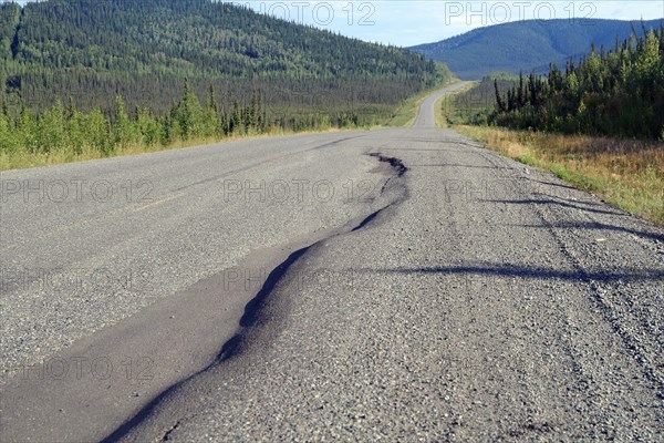 Road with large bumps and potholes, wilderness and vastness, Alaska Highway, Yukon Territory, Canada, North America