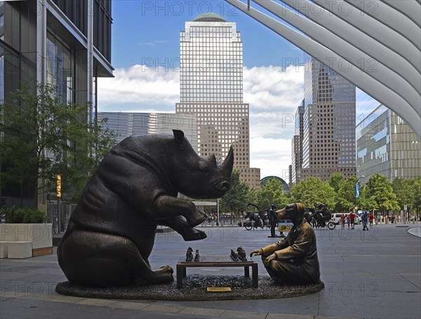 Bronze artwork for endangered animals, rhino and dog playing chess, exhibition A Wild Life for Wildlife, artists Gillie and Marc, in front of Oculus building, Transportation Hub, Ground Zero, Lower Manhattan, New York City, New York, USA, North America