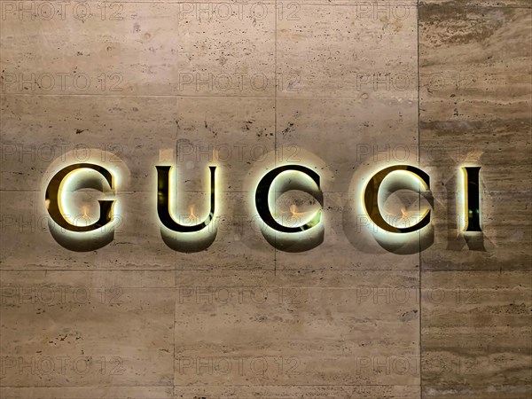 Gucci Illuminated on a Wall in Switzerland