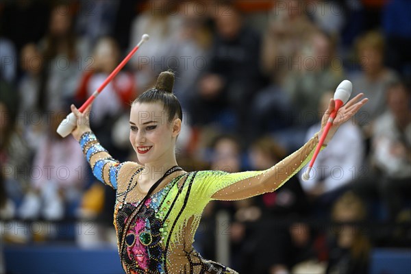 World champion Darja Varfolomeev (GER), action, clubs, rhythmic gymnastics, RSG, Schmiden International 2024, Fellbach, Baden-Wuerttemberg, Germany, Europe