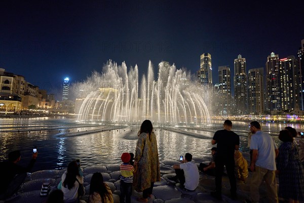 The Dubai Fountain water features on Lake Burj Khalifa. Dubai, United Arab Emirates, Asia