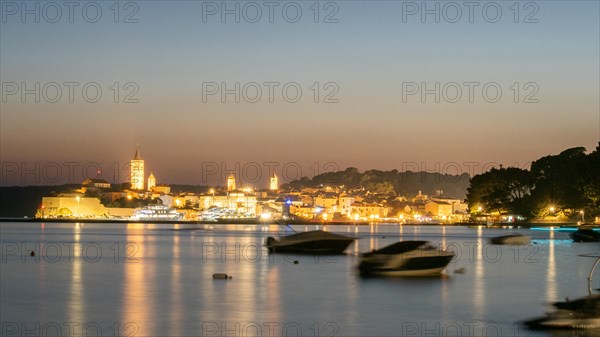 Night shot, illuminated church towers, old town centre of Rab, town of Rab, island of Rab, Kvarner Gulf Bay, Croatia, Europe