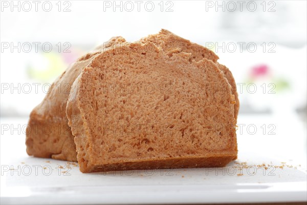 Wheat bread sliced on a board