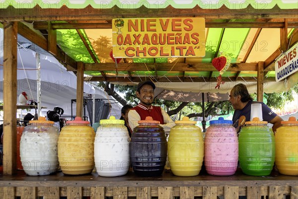 Oaxaca, Mexico, A stand on a busy street sells flavored cold drinks, Central America